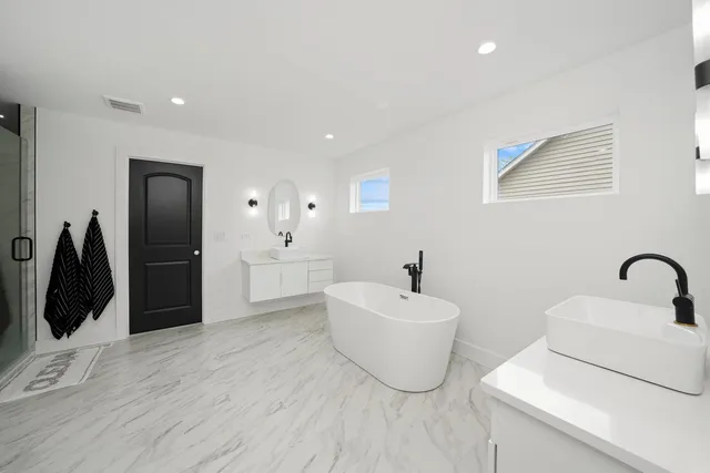 a bathroom with a sink and a bathtub
