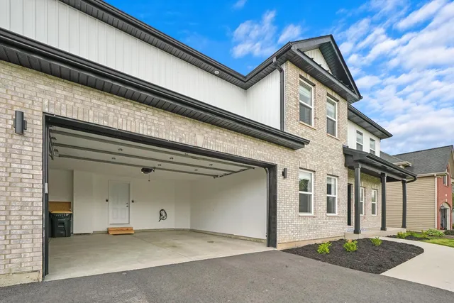 a view of a house with a garage