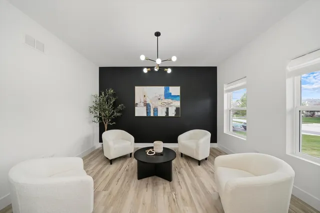 a bathroom with a toilet sink tub and window