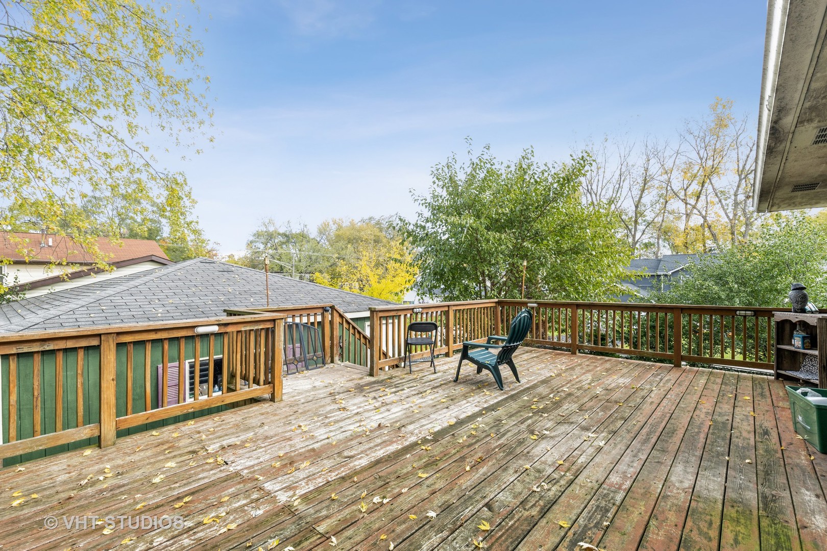 414 Garfield Road Ingleside, IL 60041 - Photo 4 of 13 a view of a house with wooden deck and furniture