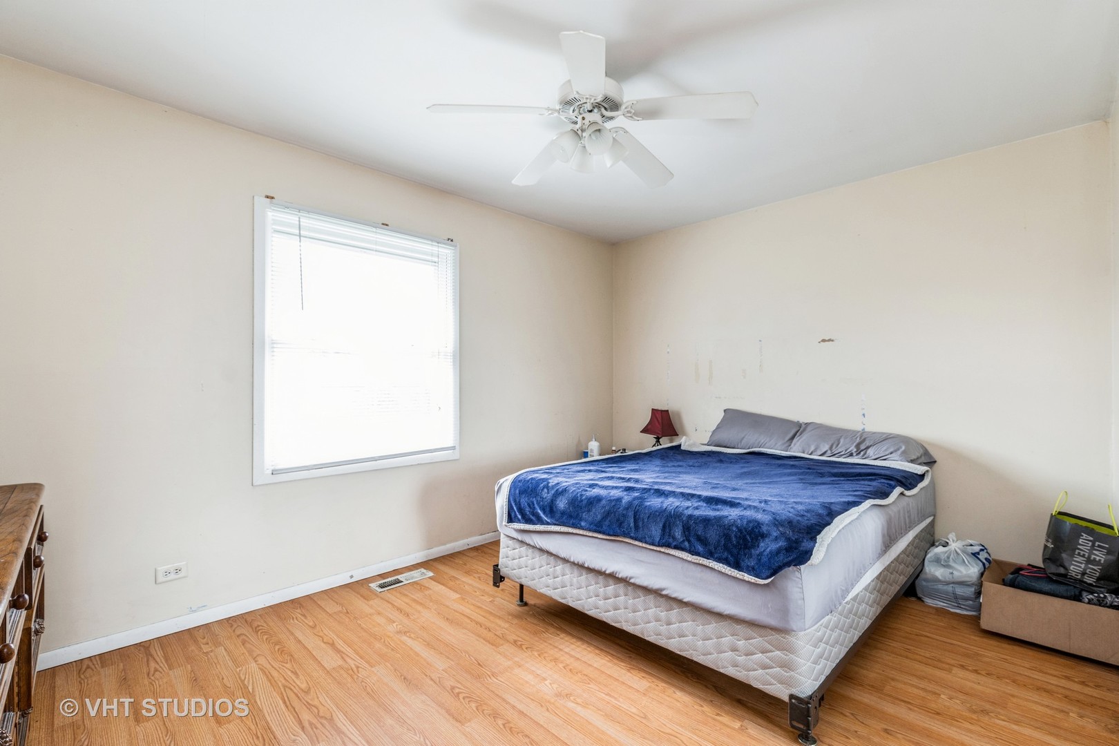 414 Garfield Road Ingleside, IL 60041 - Photo 9 of 13 a bed sitting in a bedroom next to a window
