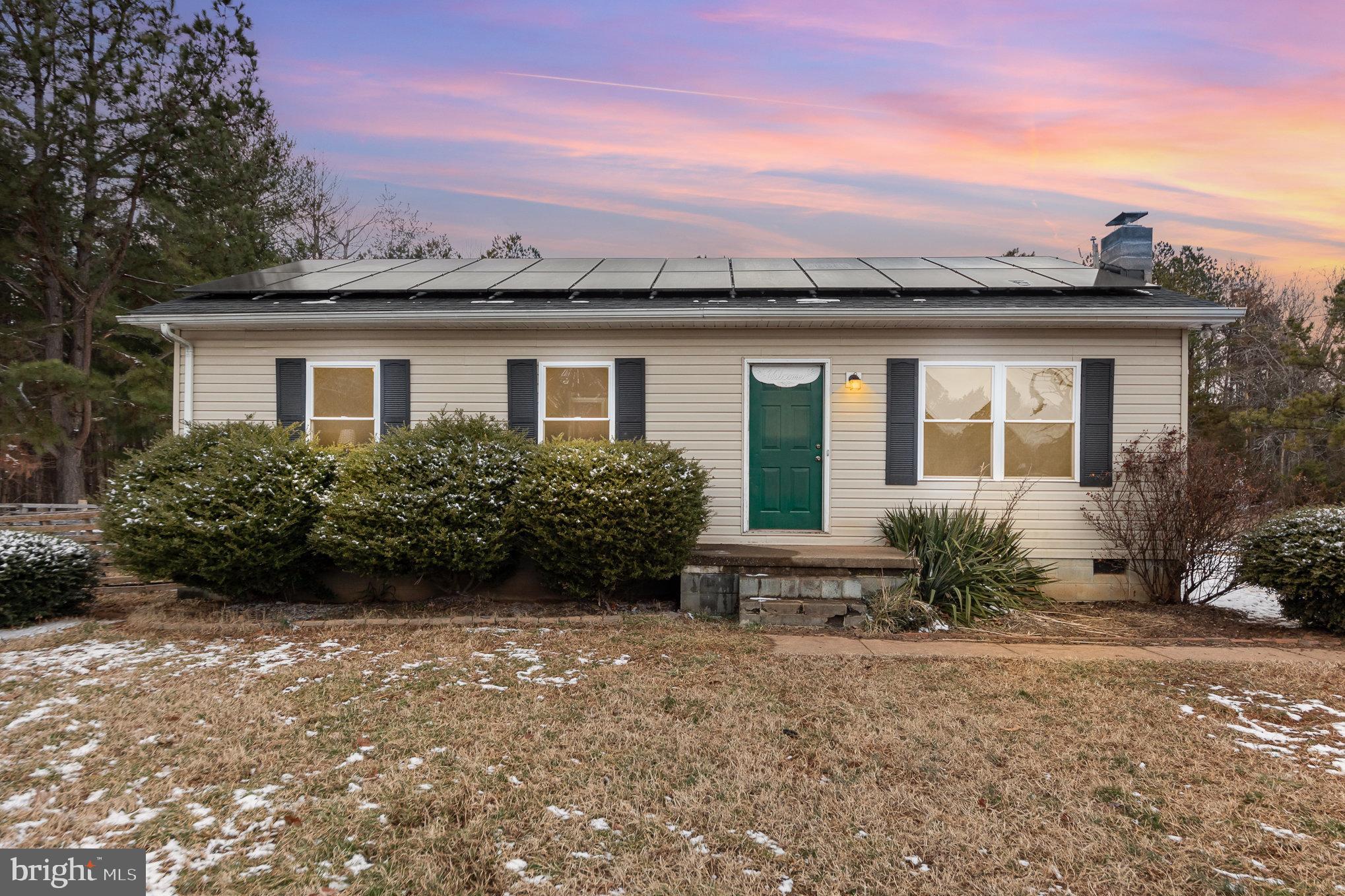 39 Twin Cedars Road Mineral, VA 23117 - Photo 1 of 21 a front view of a house with a yard