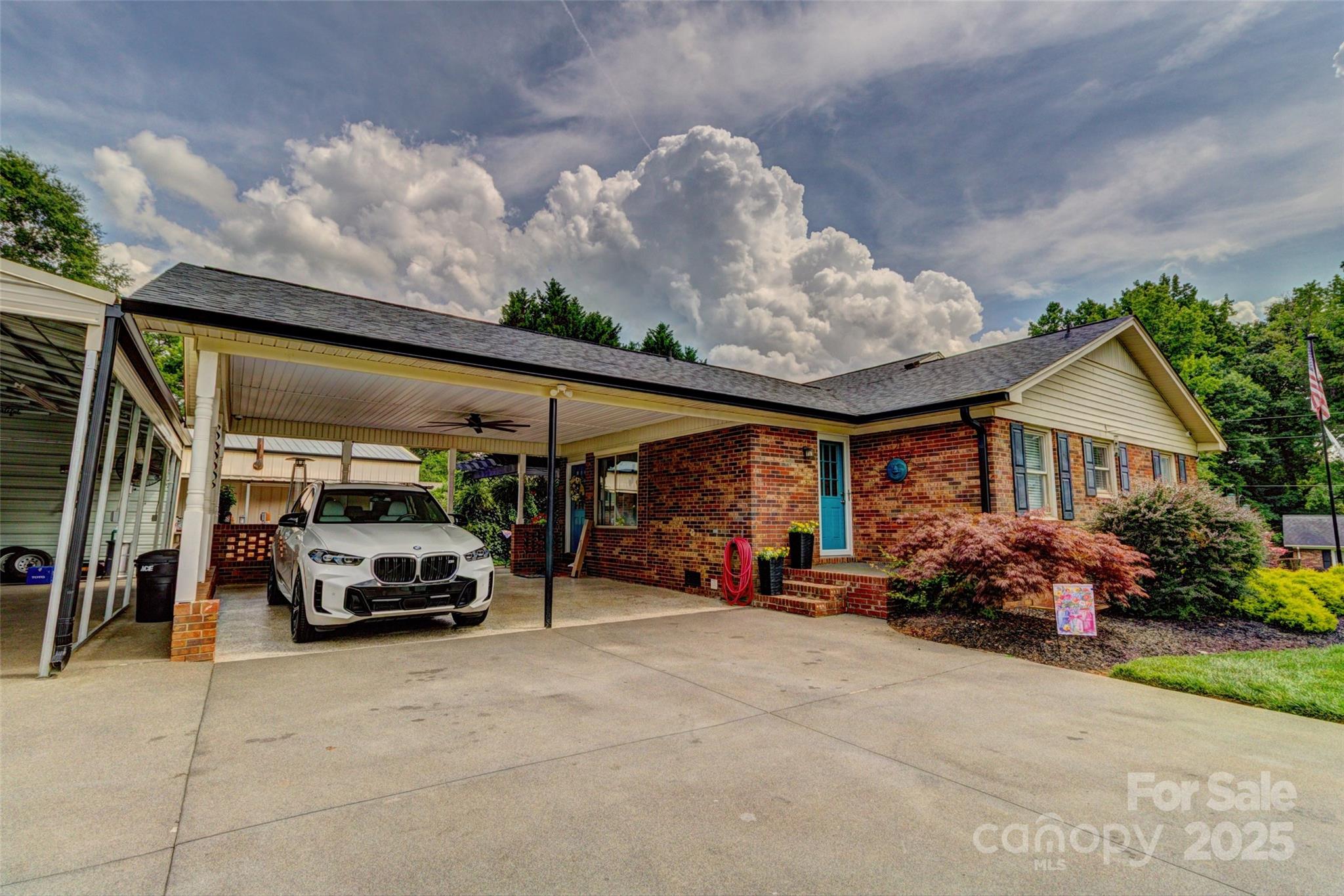253 Suncrest Road Cherryville, NC 28021 - Photo 14 of 33 a view of car parked in front of house