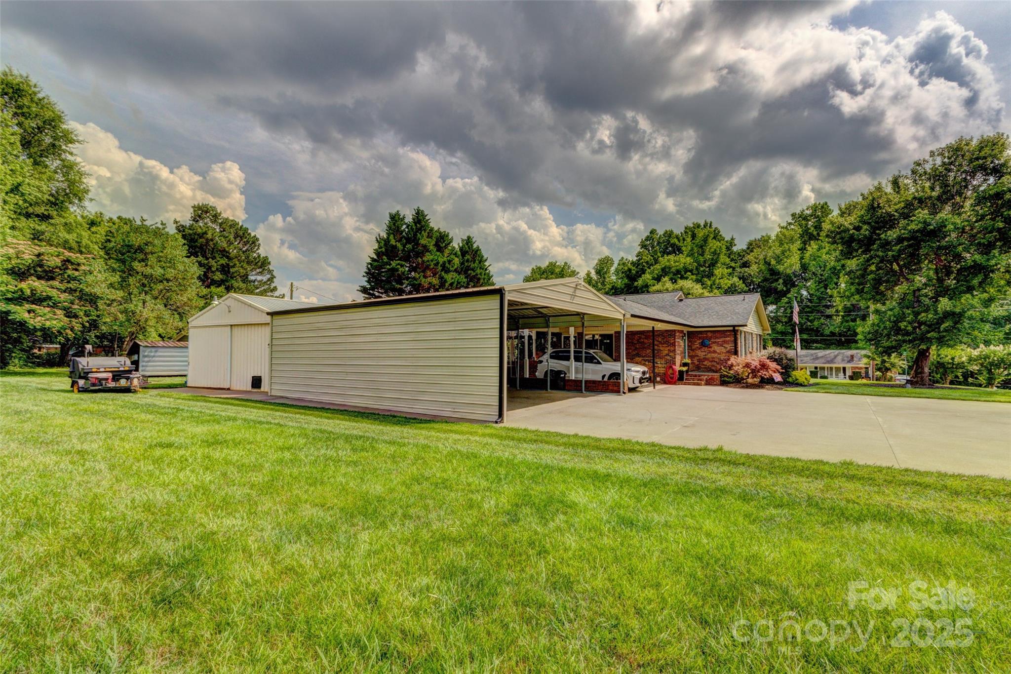 253 Suncrest Road Cherryville, NC 28021 - Photo 17 of 33 a view of a house with pool table and chairs with wooden fence