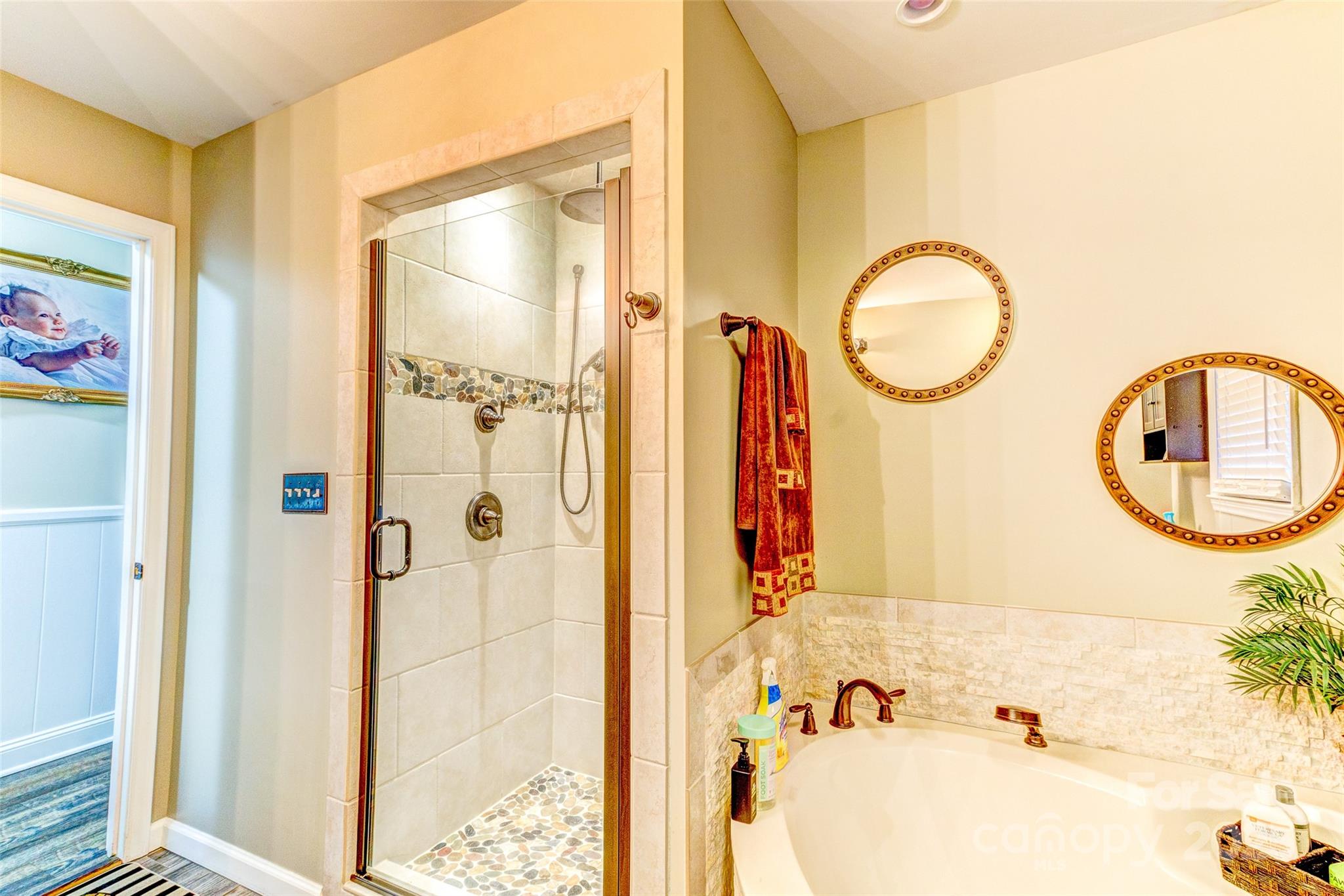 253 Suncrest Road Cherryville, NC 28021 - Photo 28 of 33 a bathroom with a bathtub and a shower