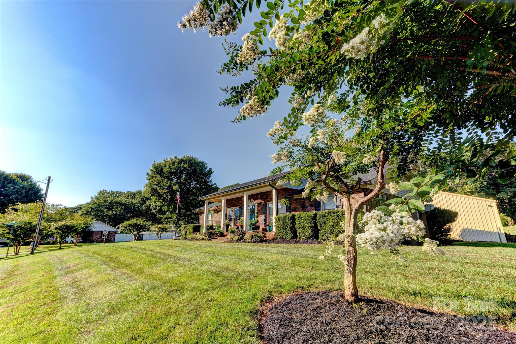 253 Suncrest Road Cherryville, NC 28021 - Photo 3 of 33 a front view of a house with a yard