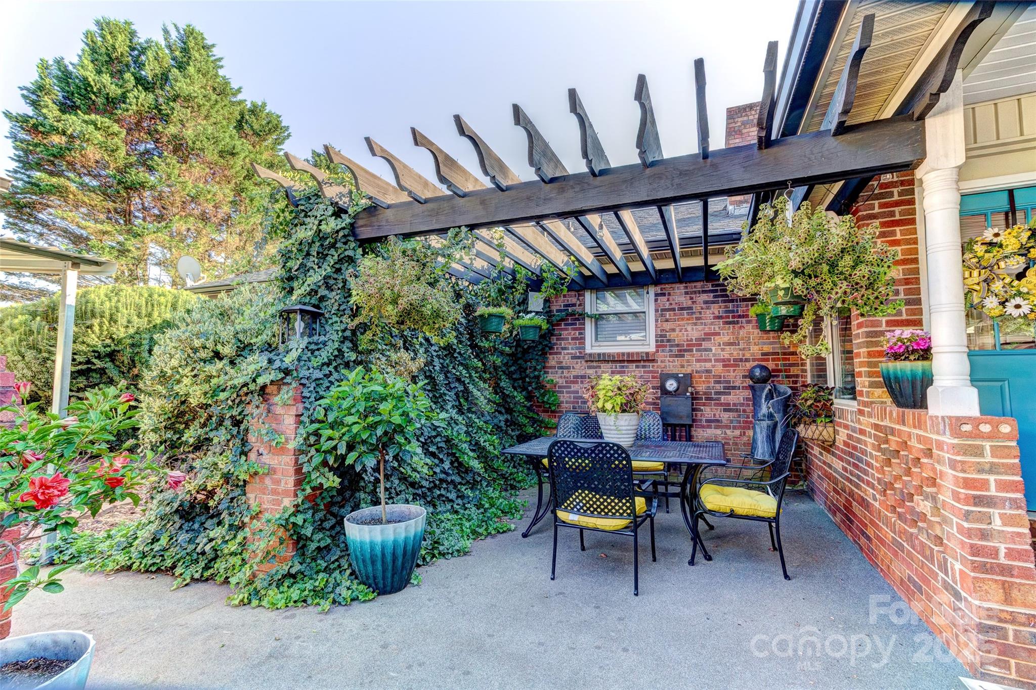 253 Suncrest Road Cherryville, NC 28021 - Photo 10 of 33 a view of a chairs and table in the patio