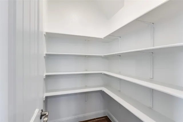 a kitchen with a sink a counter space and appliances