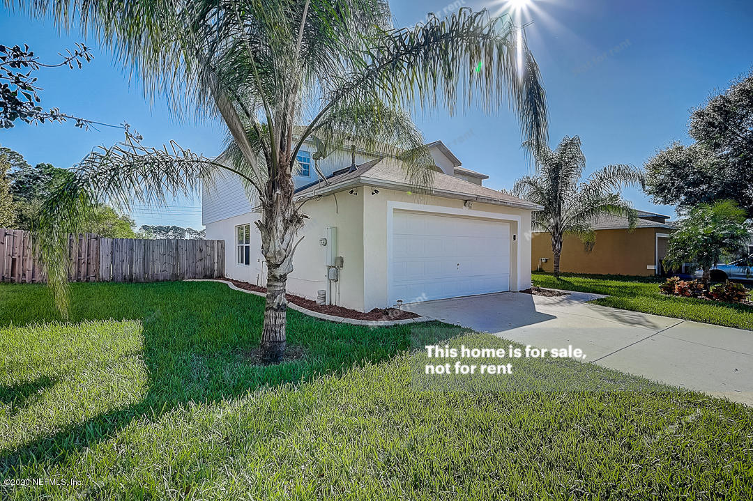 7115 High Bluff Road Jacksonville, FL 32244 - Photo 37 of 45 a house view with a garden space