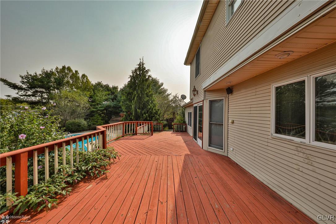 517 Roberts Road Nazareth, PA 18064 - Photo 11 of 50 a balcony with wooden floor and fence