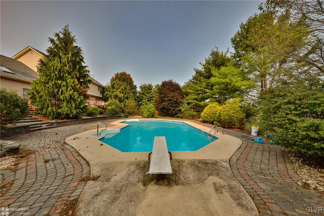 517 Roberts Road Nazareth, PA 18064 - Photo 14 of 50 a view of a swimming pool with a yard