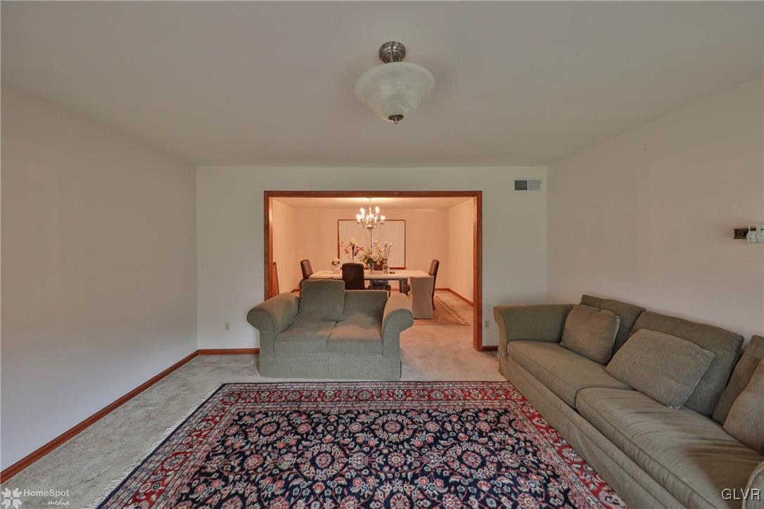 517 Roberts Road Nazareth, PA 18064 - Photo 24 of 50 a living room with furniture and a rug