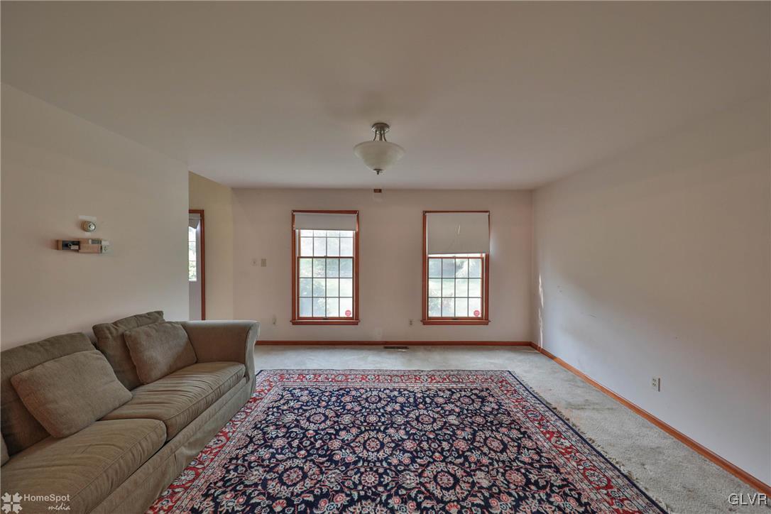 517 Roberts Road Nazareth, PA 18064 - Photo 25 of 50 a living room with furniture and a window