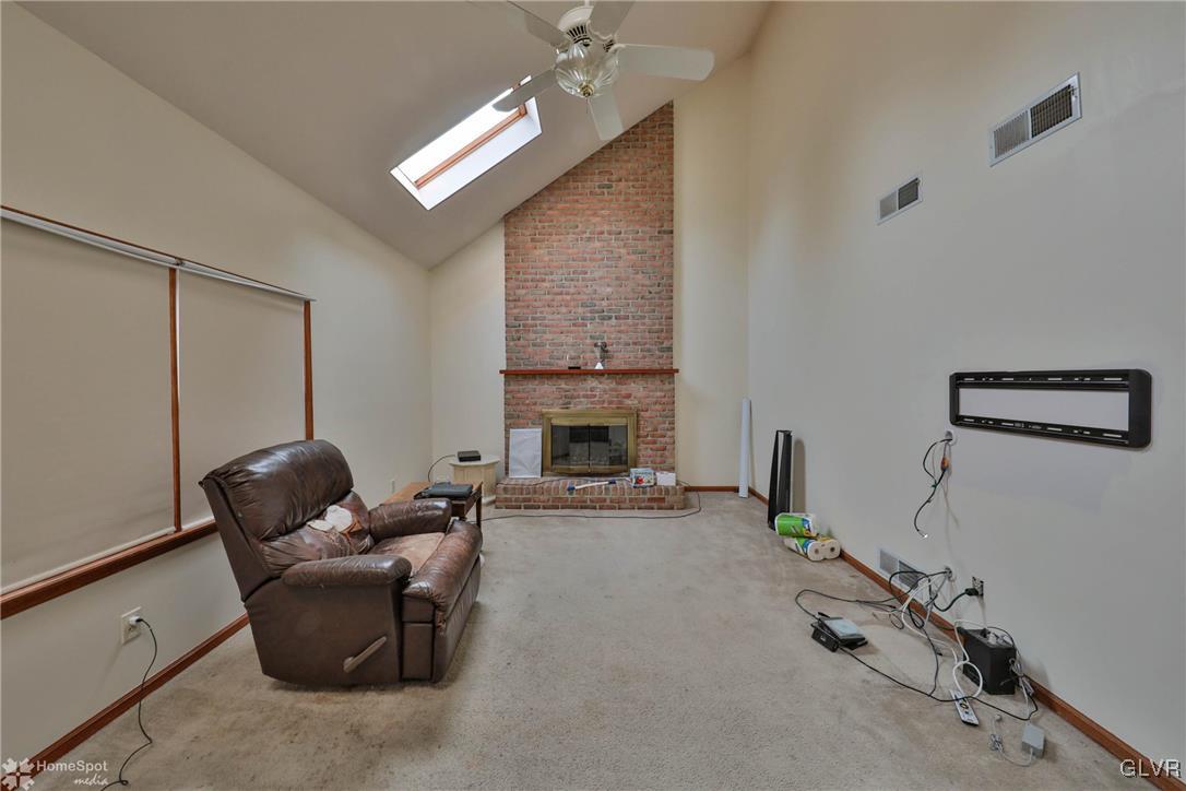 517 Roberts Road Nazareth, PA 18064 - Photo 33 of 50 a living room with furniture and a fireplace