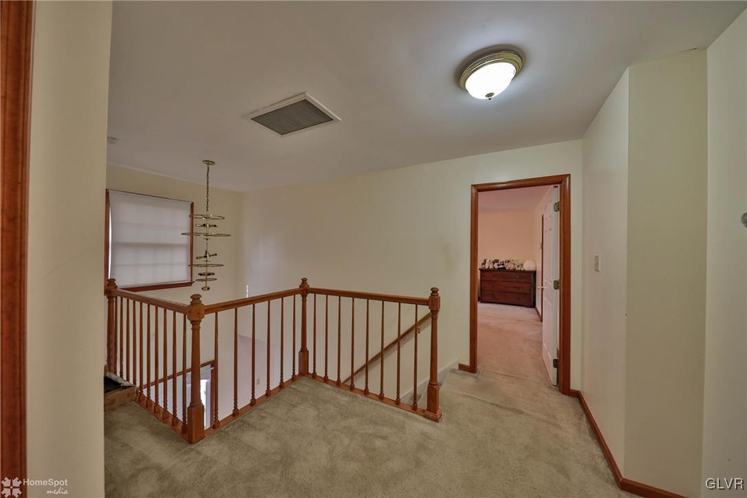 517 Roberts Road Nazareth, PA 18064 - Photo 39 of 50 a view of a hallway to a room with staircase
