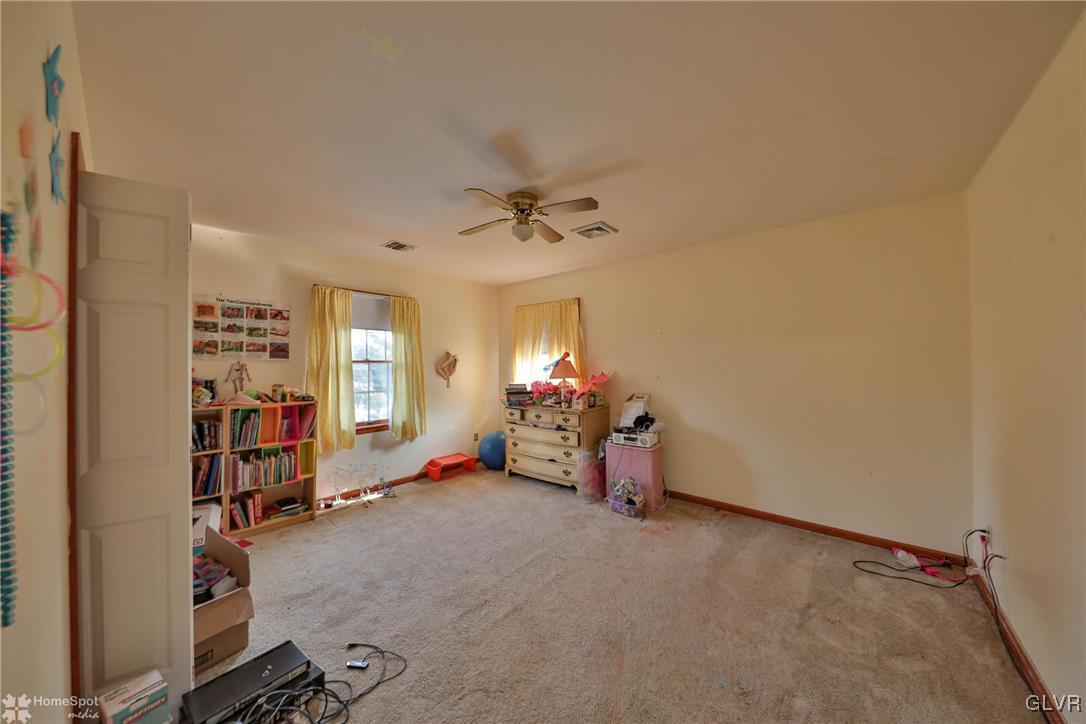 517 Roberts Road Nazareth, PA 18064 - Photo 45 of 50 a view of a livingroom with furniture and a ceiling fan
