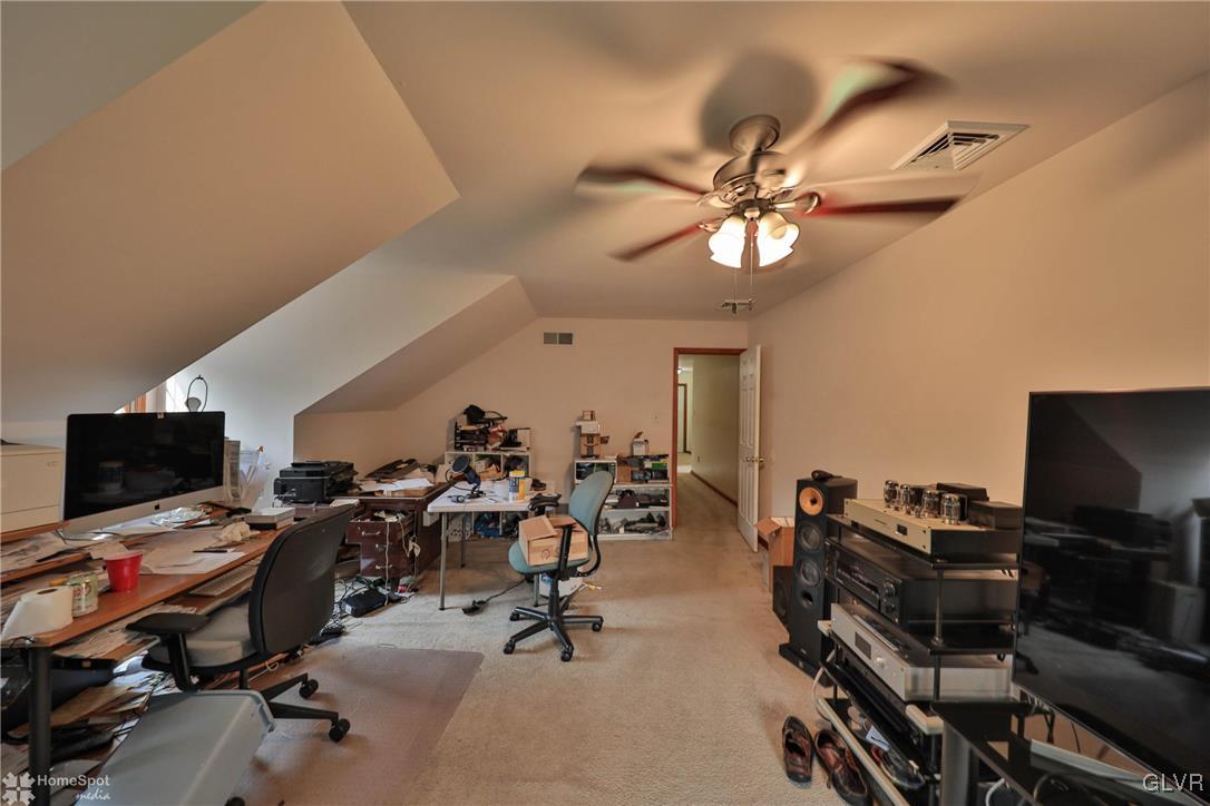 517 Roberts Road Nazareth, PA 18064 - Photo 50 of 50 a view of a workspace with furniture and a ceiling fan