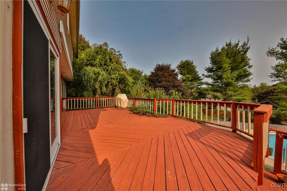 517 Roberts Road Nazareth, PA 18064 - Photo 9 of 50 a balcony with trees in front of it