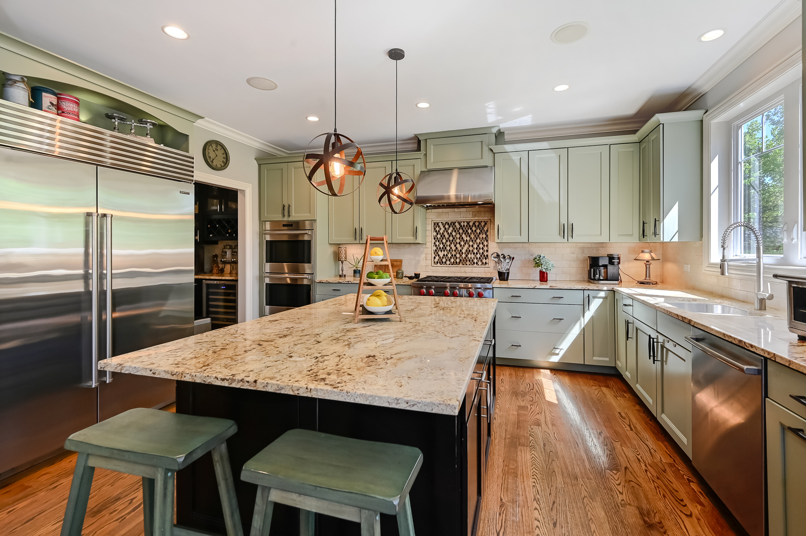 5607 Hillcrest Road Downers Grove, IL 60516 - Photo 11 of 50 a large kitchen with a table and chairs
