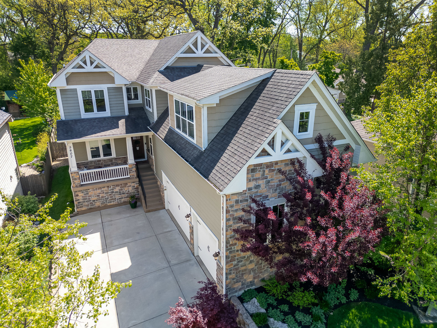 5607 Hillcrest Road Downers Grove, IL 60516 - Photo 2 of 50 a aerial view of a house with a yard and potted plants