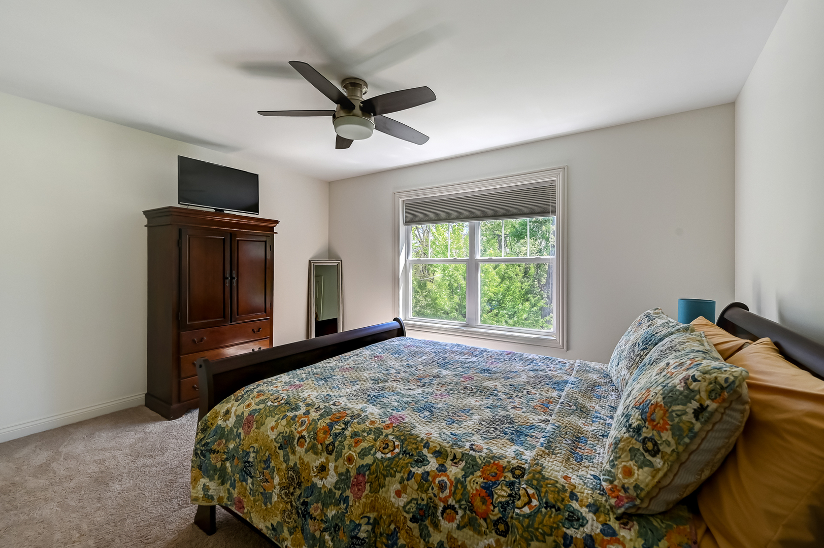 5607 Hillcrest Road Downers Grove, IL 60516 - Photo 29 of 50 a bed sitting in a bedroom next to a window