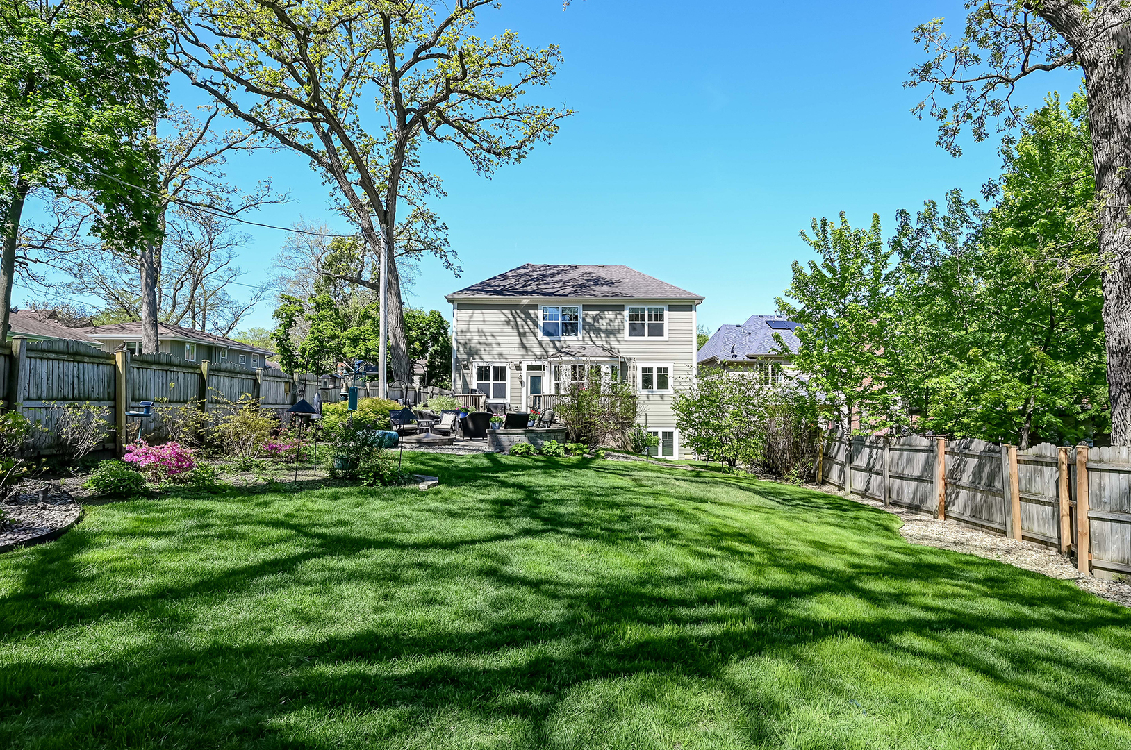 5607 Hillcrest Road Downers Grove, IL 60516 - Photo 43 of 50 a view of a house with a yard and sitting area