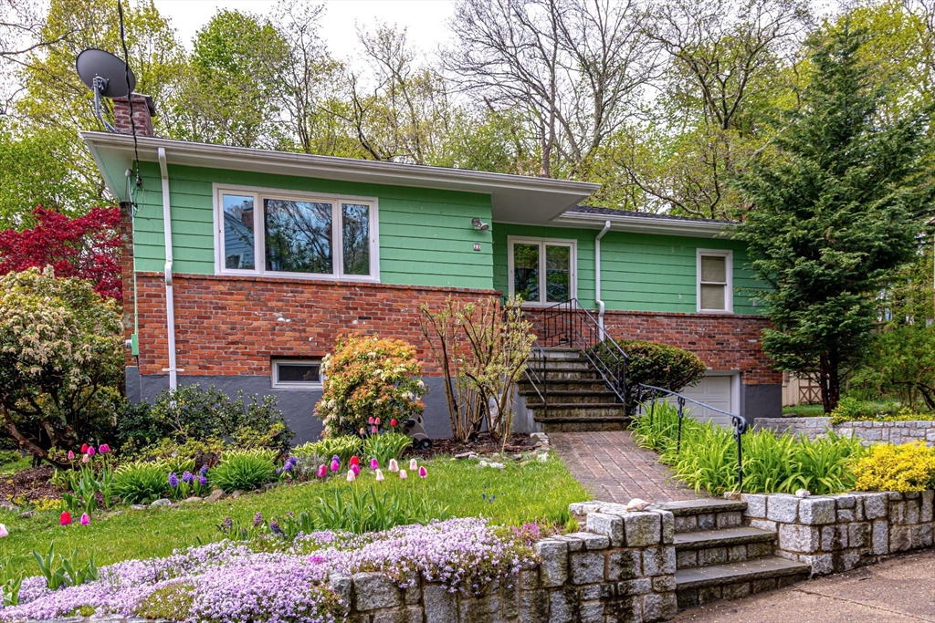 22 Rambler Road Boston, MA 02130 - Photo 1 of 28 a view of a house with a yard and potted plants