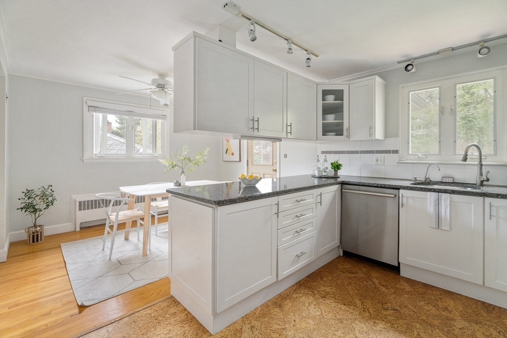 22 Rambler Road Boston, MA 02130 - Photo 12 of 28 a kitchen with a sink cabinets and window