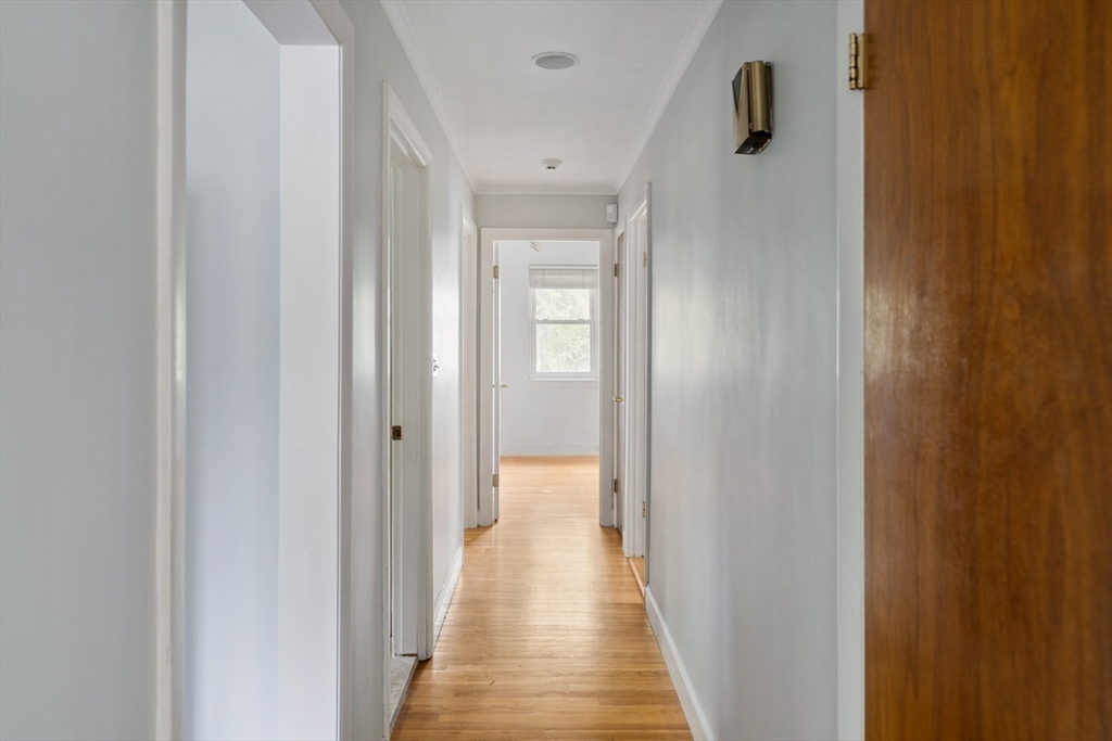 22 Rambler Road Boston, MA 02130 - Photo 13 of 28 a view of a hallway with wooden floor