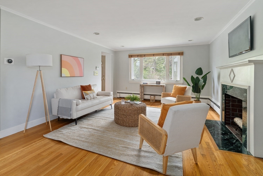 22 Rambler Road Boston, MA 02130 - Photo 3 of 28 a living room with furniture fireplace and a flat screen tv