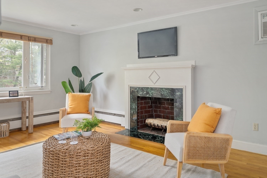 22 Rambler Road Boston, MA 02130 - Photo 4 of 28 a living room with furniture and a fireplace