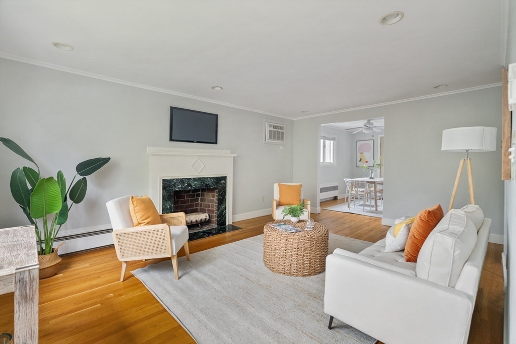 22 Rambler Road Boston, MA 02130 - Photo 7 of 28 a living room with furniture and a fireplace