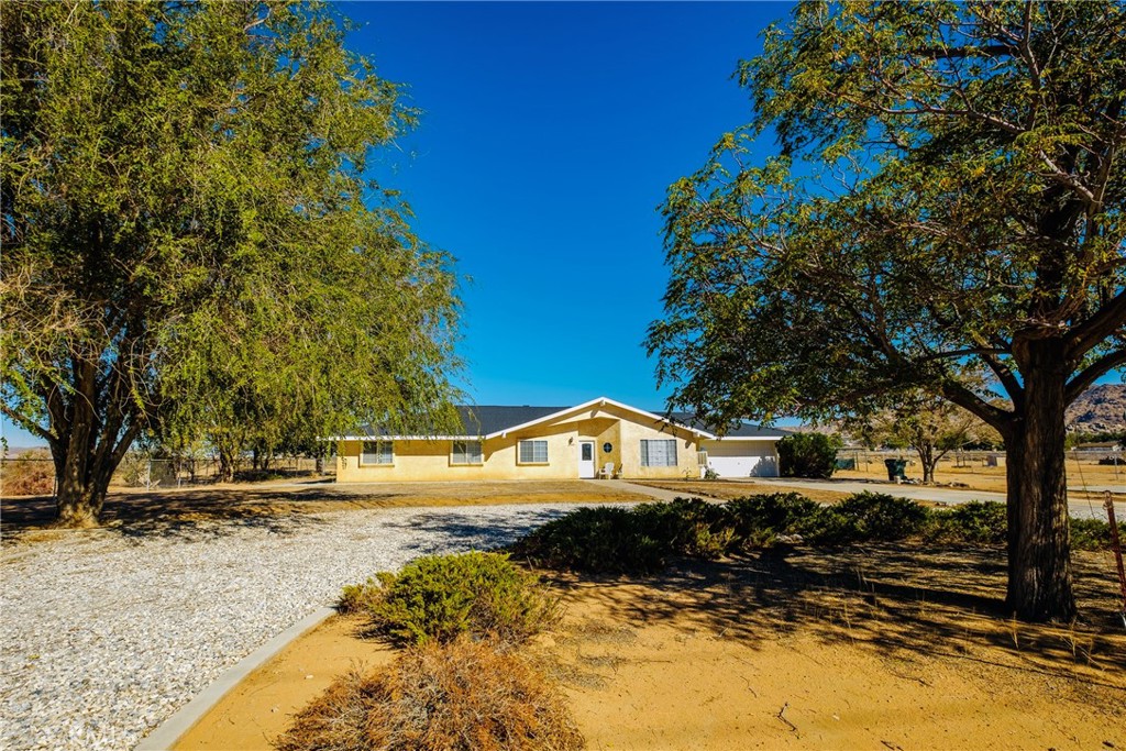 a view of houses with yard