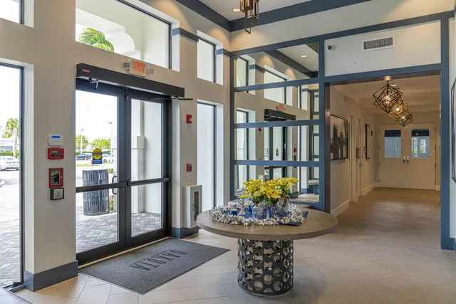 a view of a living room and entryway