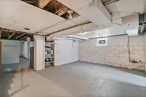 a view of a room with wooden walls