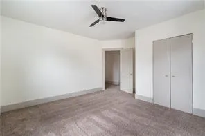 a room with a window and a chair