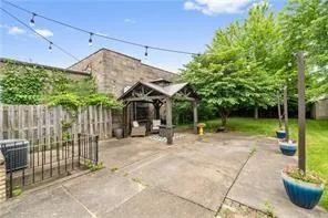 a view of backyard with green space