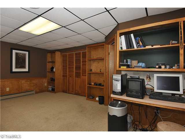 4929 Country Ridge Road Clemmons, NC 27012 - Photo 11 of 14 Den/Family/Great Room. Anotherr view of den with lots of built-ins for storage, computer equipment.