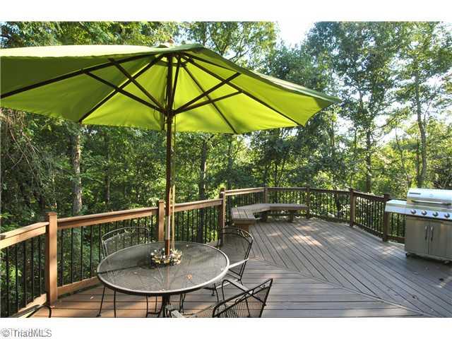 4929 Country Ridge Road Clemmons, NC 27012 - Photo 12 of 14 Exterior Front. Great deck built by Archadeck has view of private, wooded backyard.