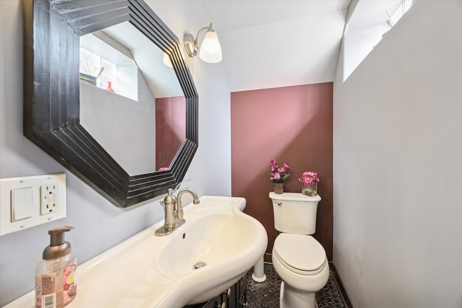 1115 North Main Street Wheaton, IL 60187 - Photo 19 of 27 a bathroom with a toilet sink and mirror