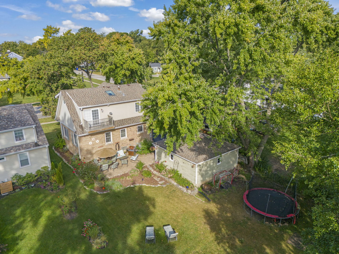 1115 North Main Street Wheaton, IL 60187 - Photo 27 of 27 an aerial view of a house with yard swimming pool and outdoor seating
