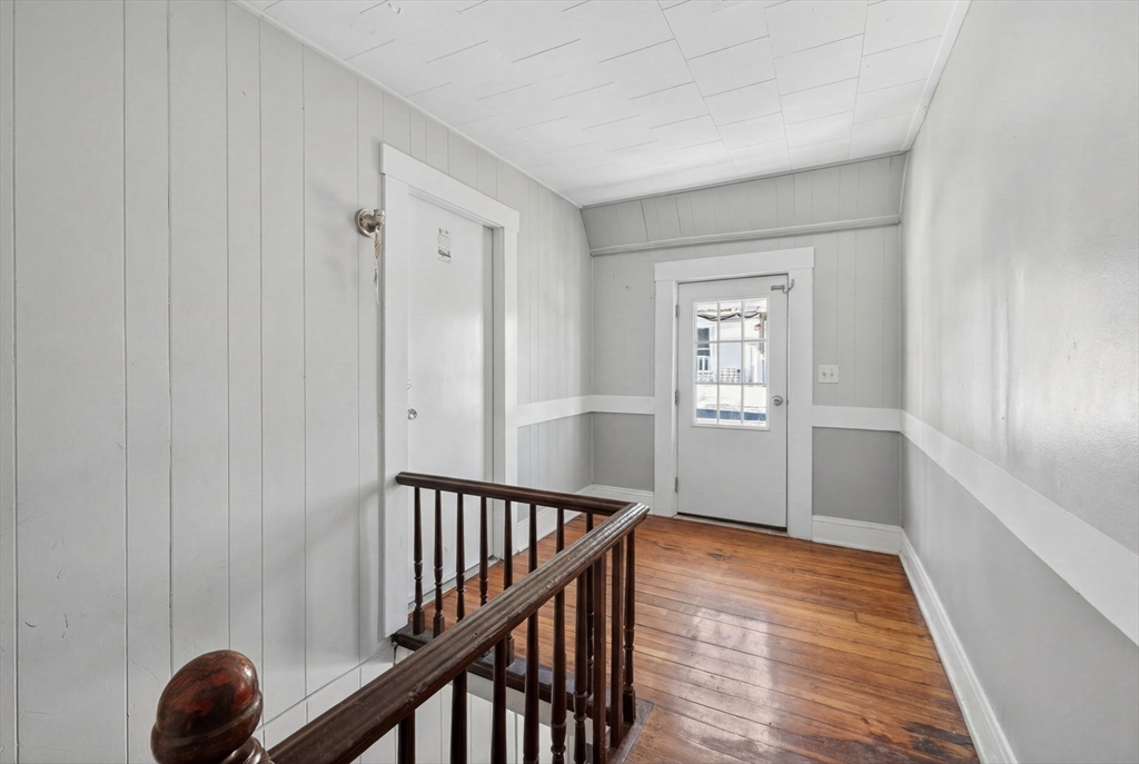 6 Morris Street Lynn, MA 01905 - Photo 16 of 36 a view of a hallway with entryway and wooden floor