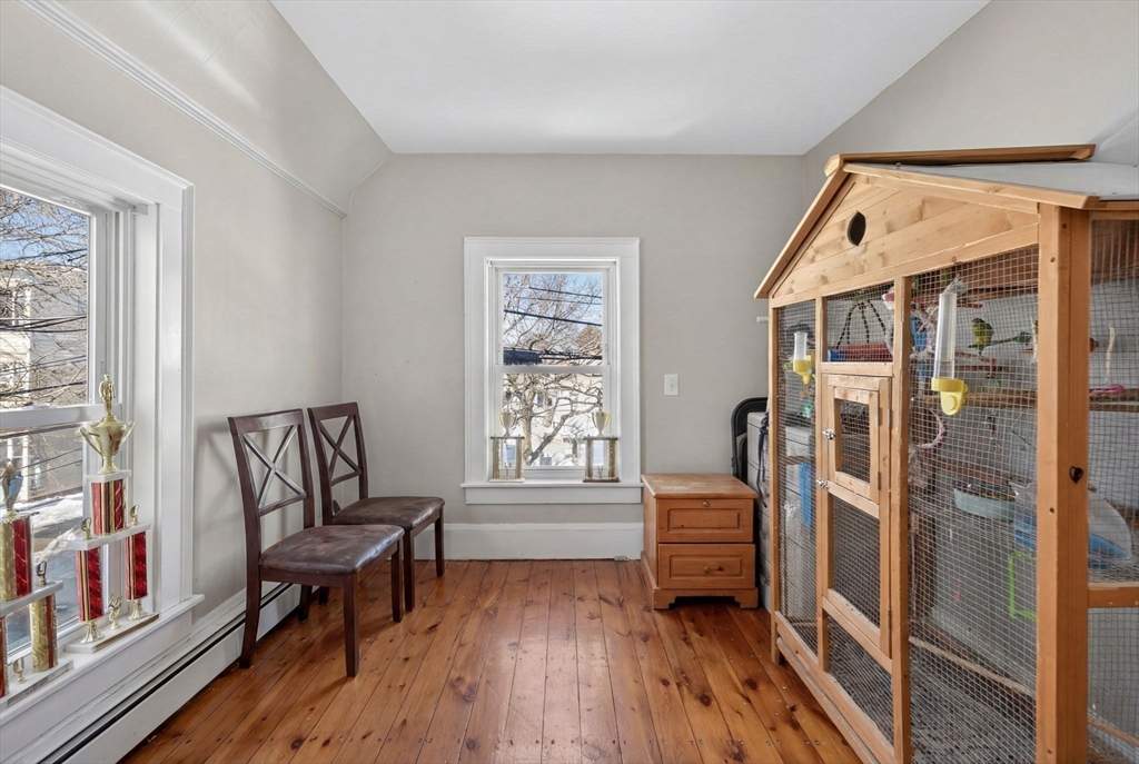 6 Morris Street Lynn, MA 01905 - Photo 22 of 36 a bedroom with furniture and a window