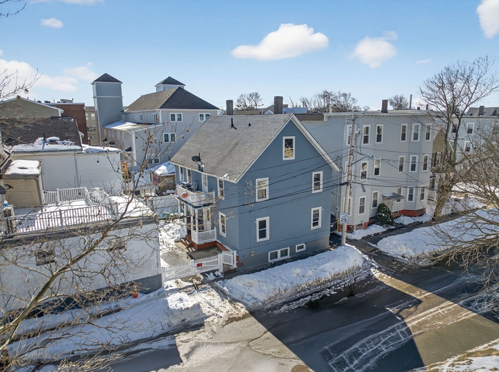 6 Morris Street Lynn, MA 01905 - Photo 33 of 36 a view of a big house with a big yard