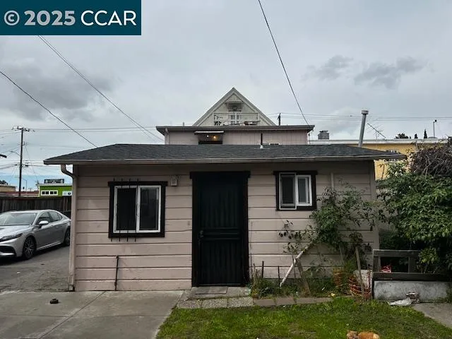 a view of a house with a sink and a yard