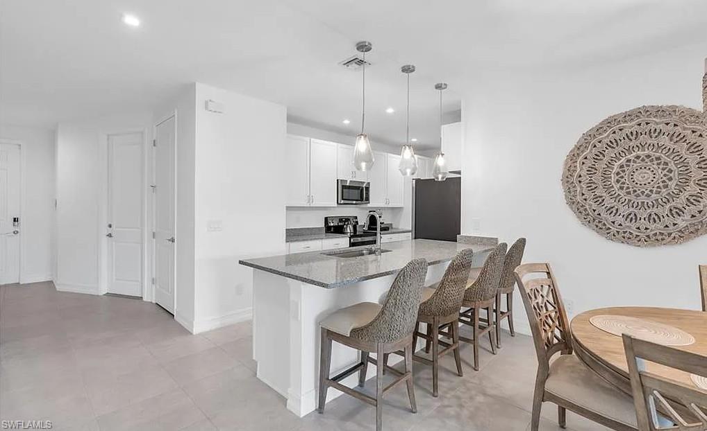 7624 Morgan Way Naples, FL 34119 - Photo 13 of 35