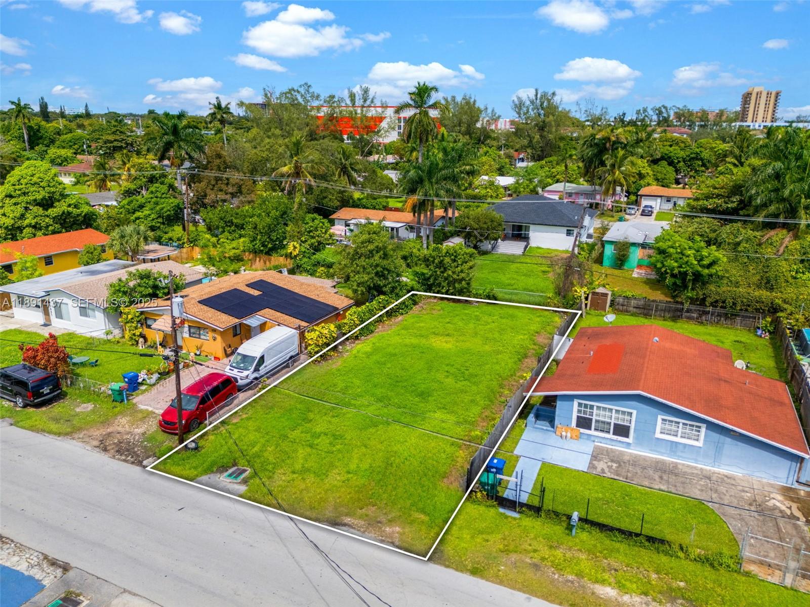 1453 Northeast 117th Street Miami, FL 33161 - Photo 4 of 15 a view of an outdoor space pool patio and outdoor seating