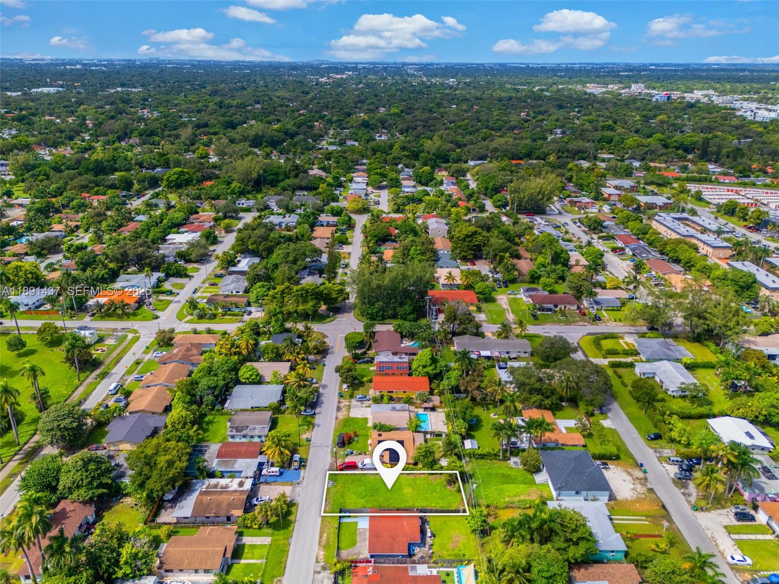 1453 Northeast 117th Street Miami, FL 33161 - Photo 10 of 15 an aerial view of multiple house