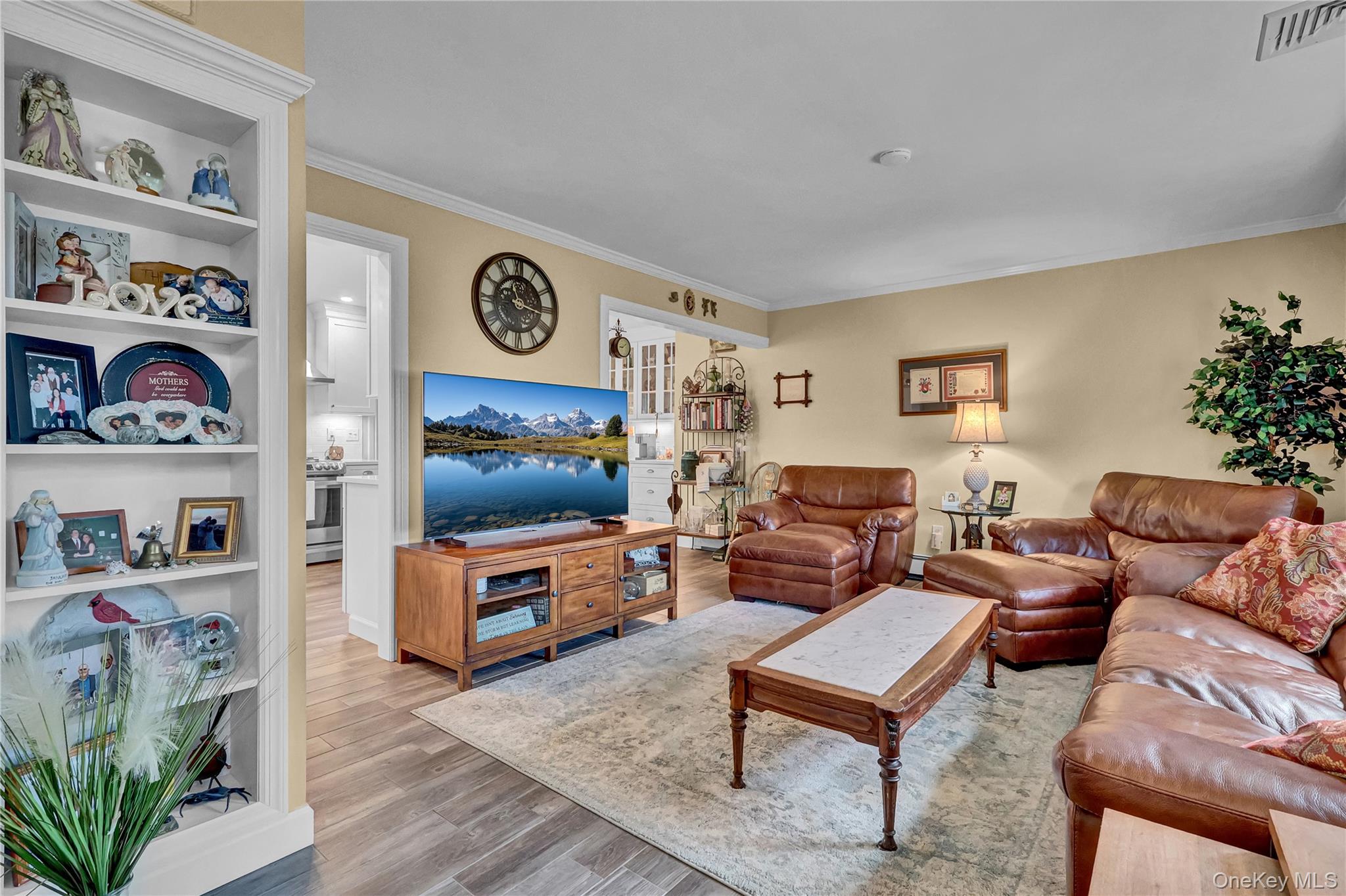 171 Prince Road Rocky Point, NY 11778 - Photo 13 of 35 Living room with built in shelving