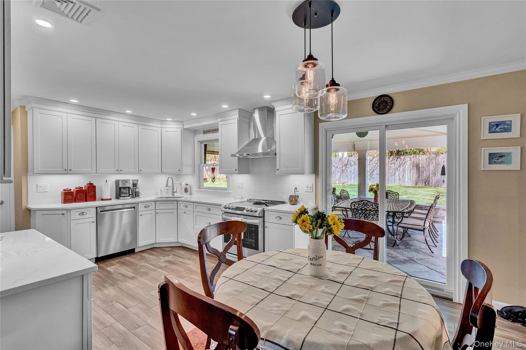 171 Prince Road Rocky Point, NY 11778 - Photo 15 of 35 Large & bright eat-in kitchen with patio sliders to covered patio